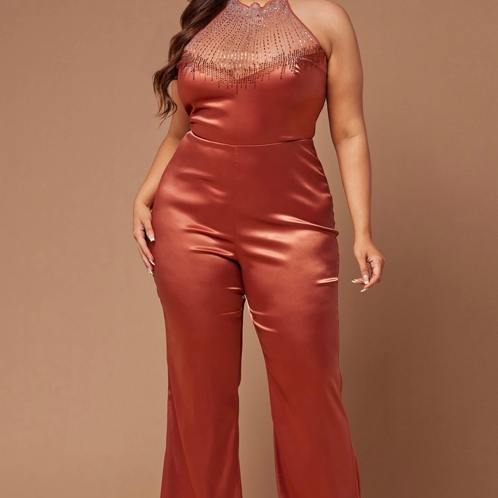 Gorgeous mocha colored jumpsuit with jeweled neckline!